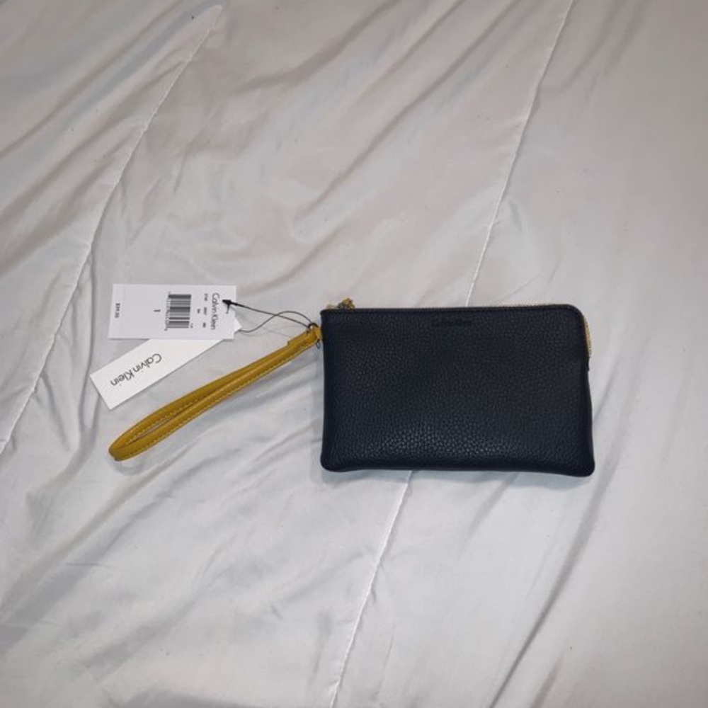 “calvin klein” wristlet